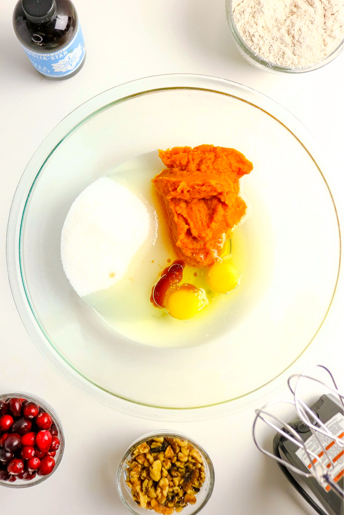 Wet ingredients for pumpkin bread.