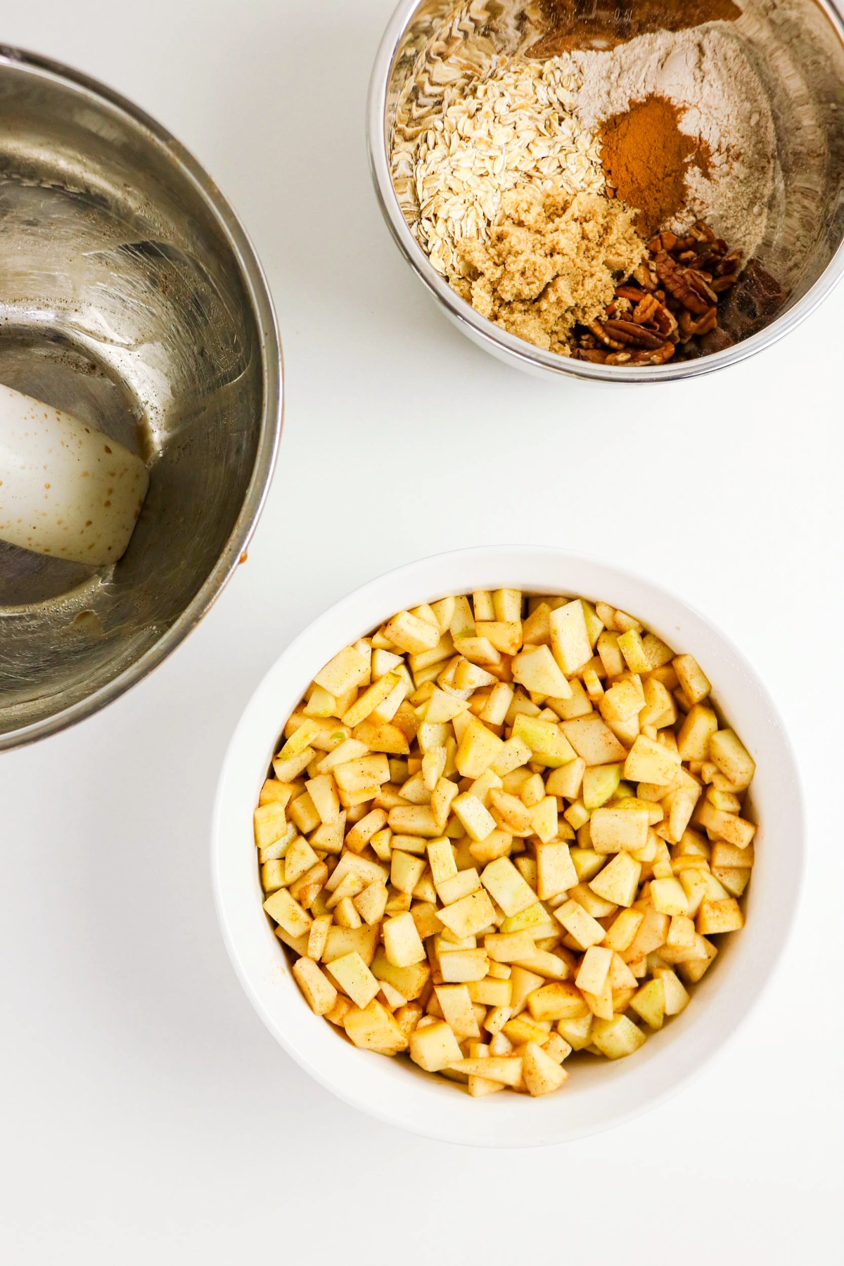 Diced apples in a baking dish before adding a topping.
