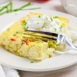 Cottage Cheese egg bake with bell peppers on a white serving plate