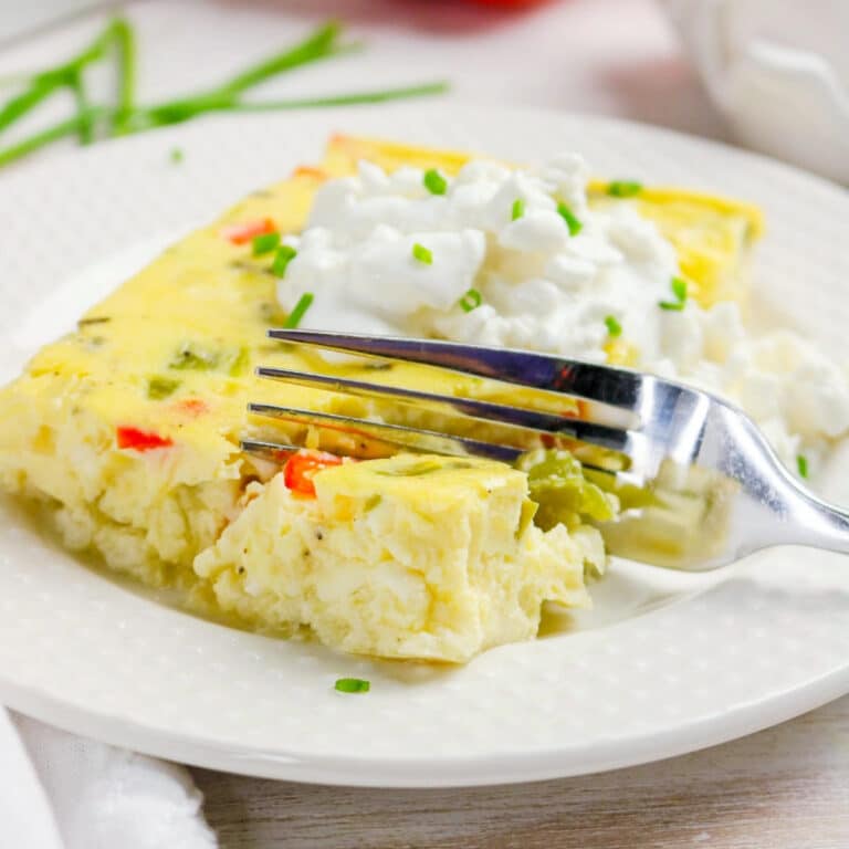 Cottage Cheese egg bake with bell peppers on a white serving plate