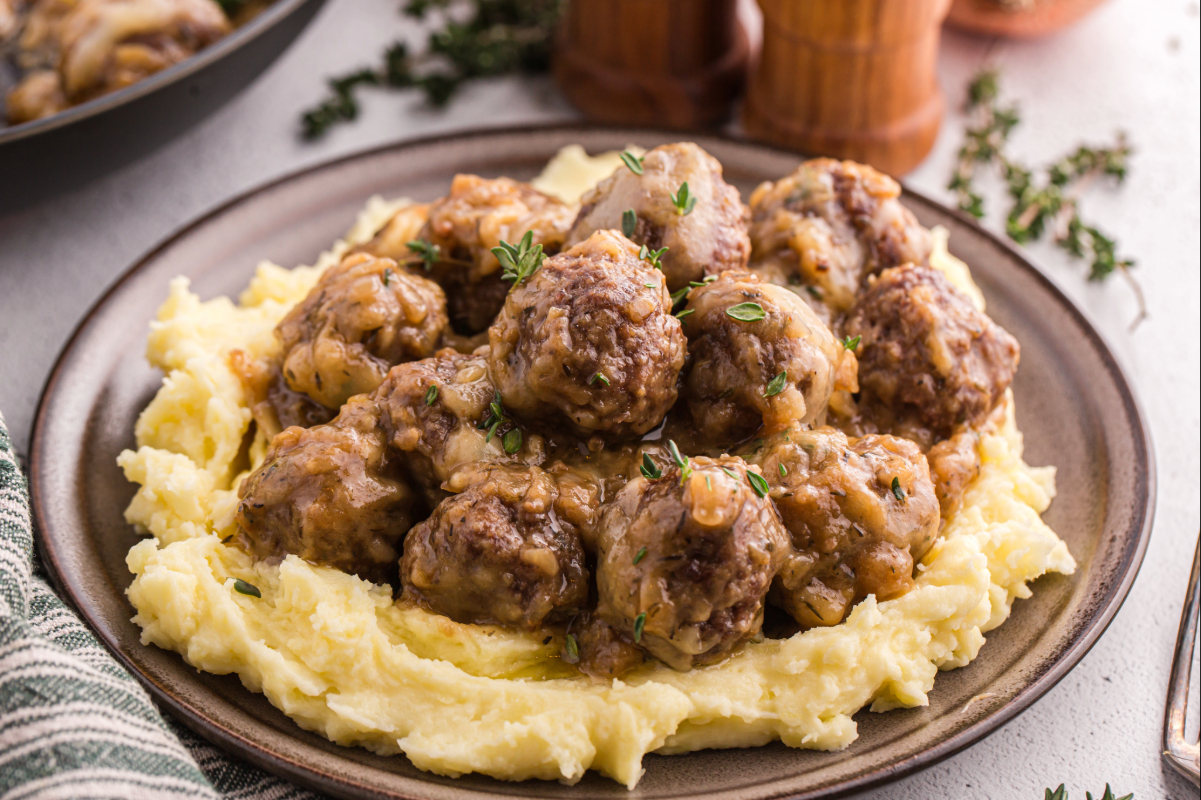 Meatballs over mashed potatoes.