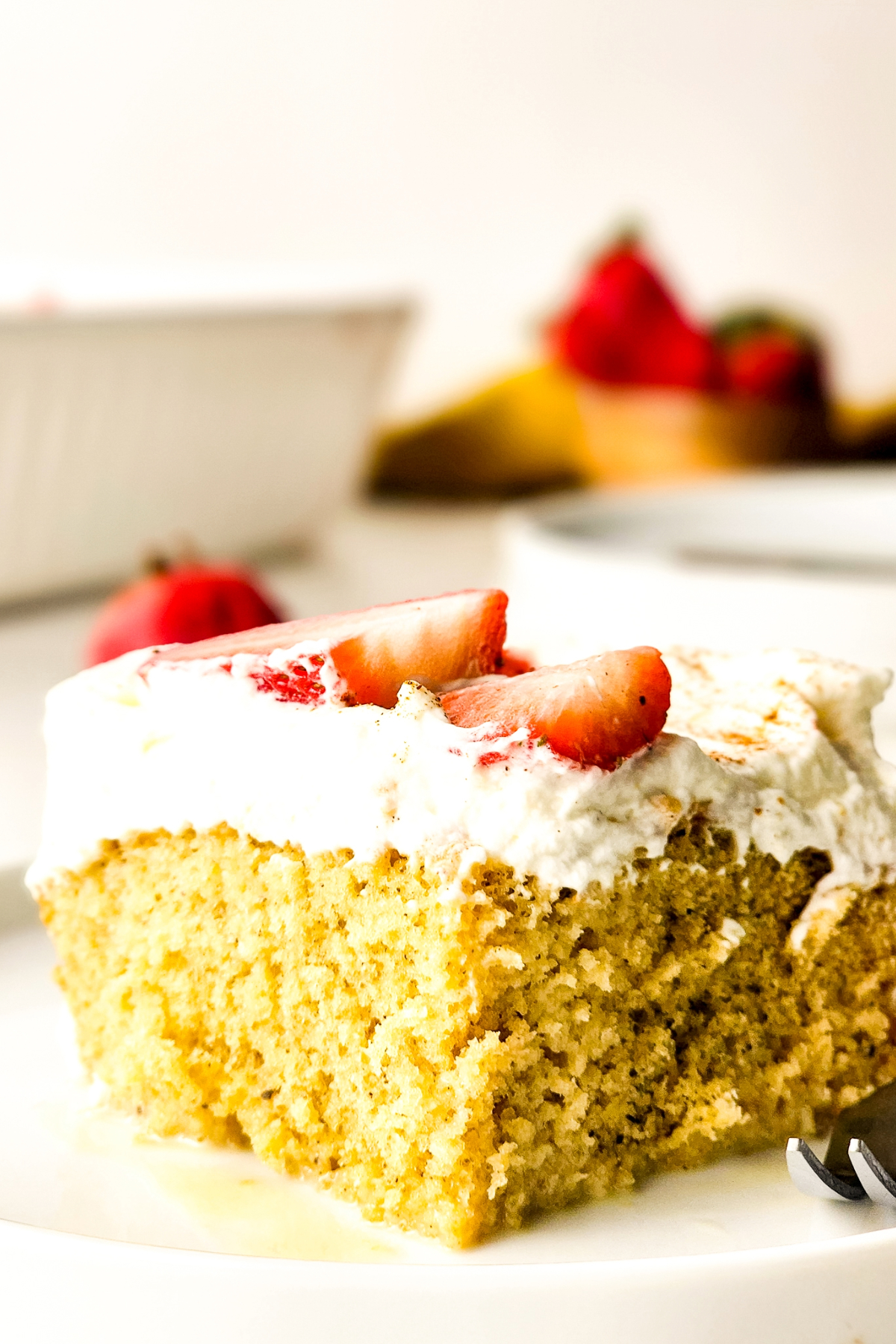 tres leches cake on a plate ready to enjoy.