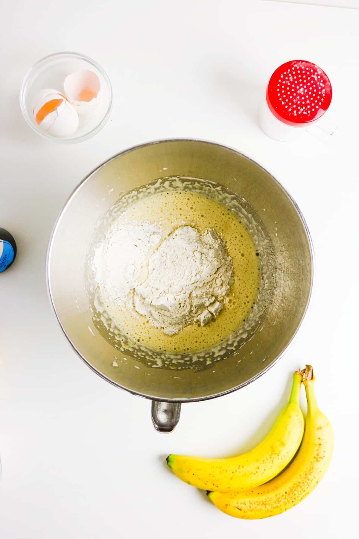 Dry cake ingredients added to wet ingredients before mixing.
