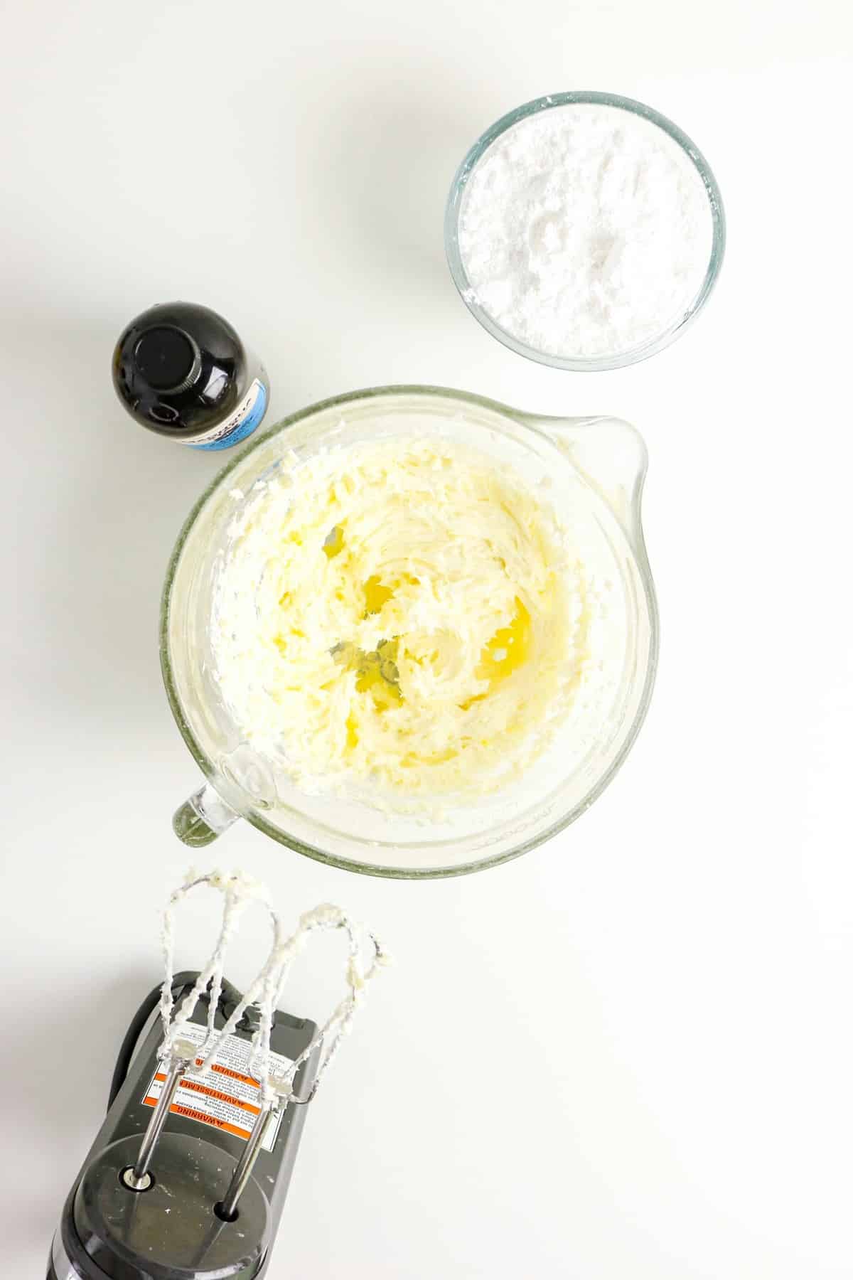 cream cheese filling in a clear mixing bowl.