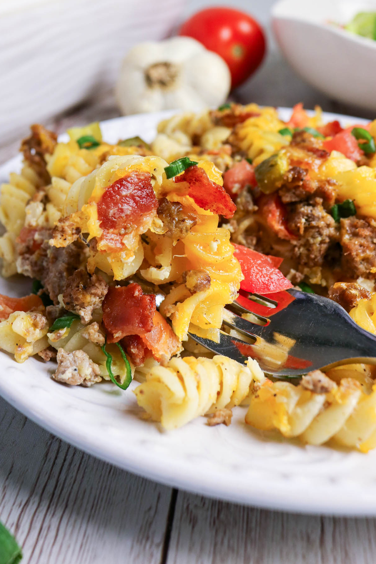 Close photo of dinner plate of pasta with beef.