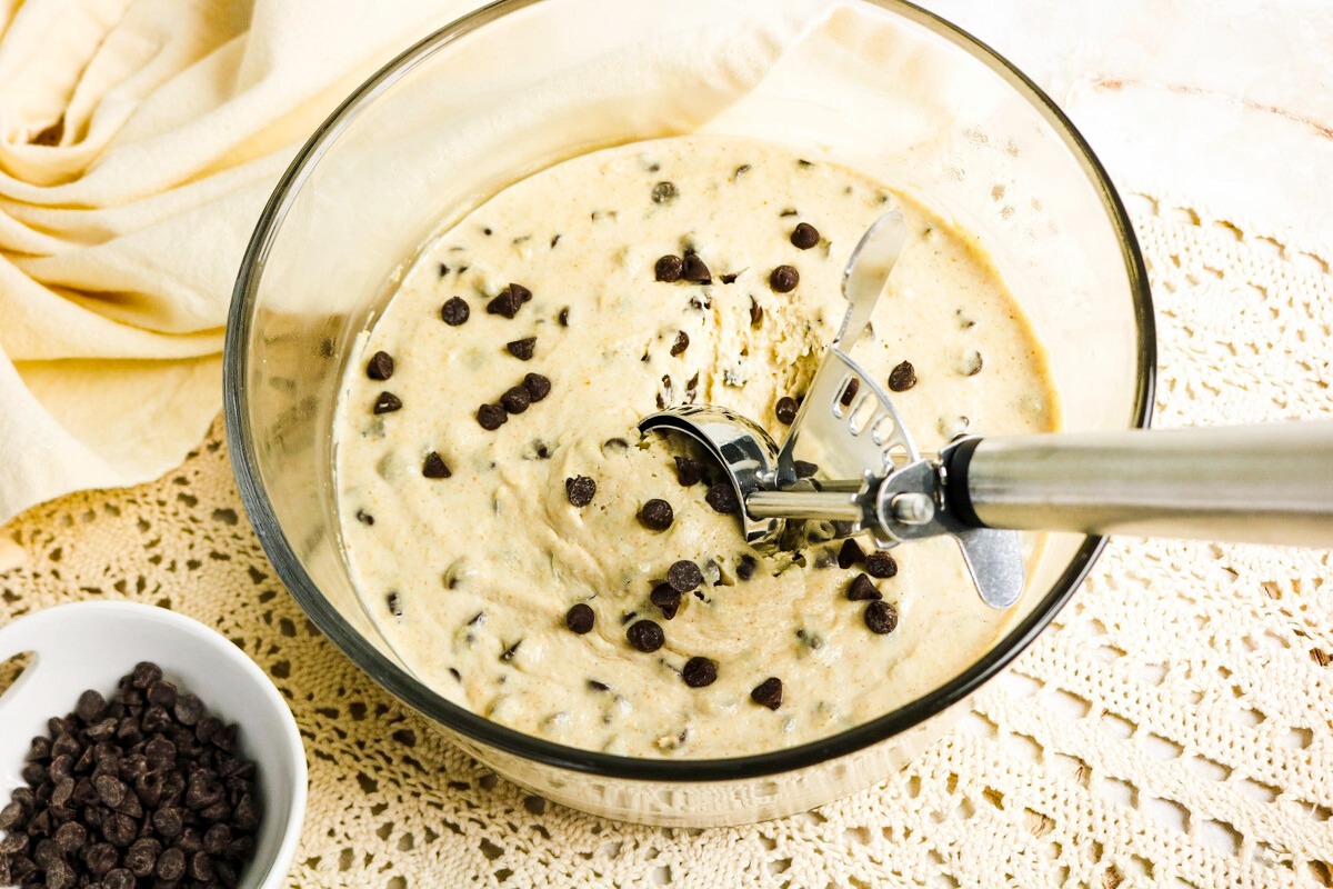 homemade cookie dough in a clear mixing bowl before serving.