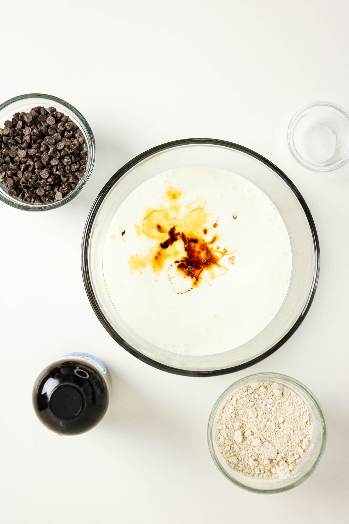 creamed cottage cheese with vanilla and maple syrup in a clear mixing bowl.