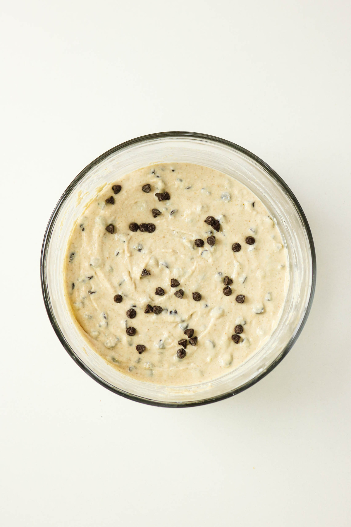chilled cottage cheese cookie dough in a clear mixing bowl.