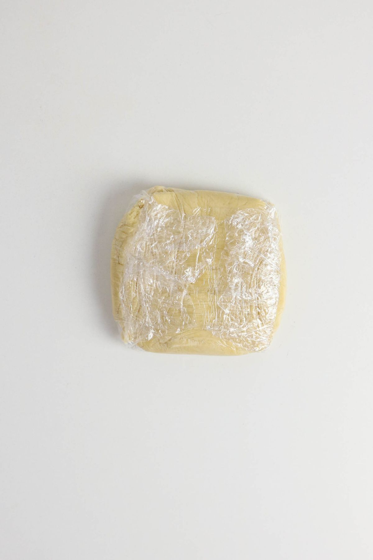 Dough wrapped in a plastic wrap.