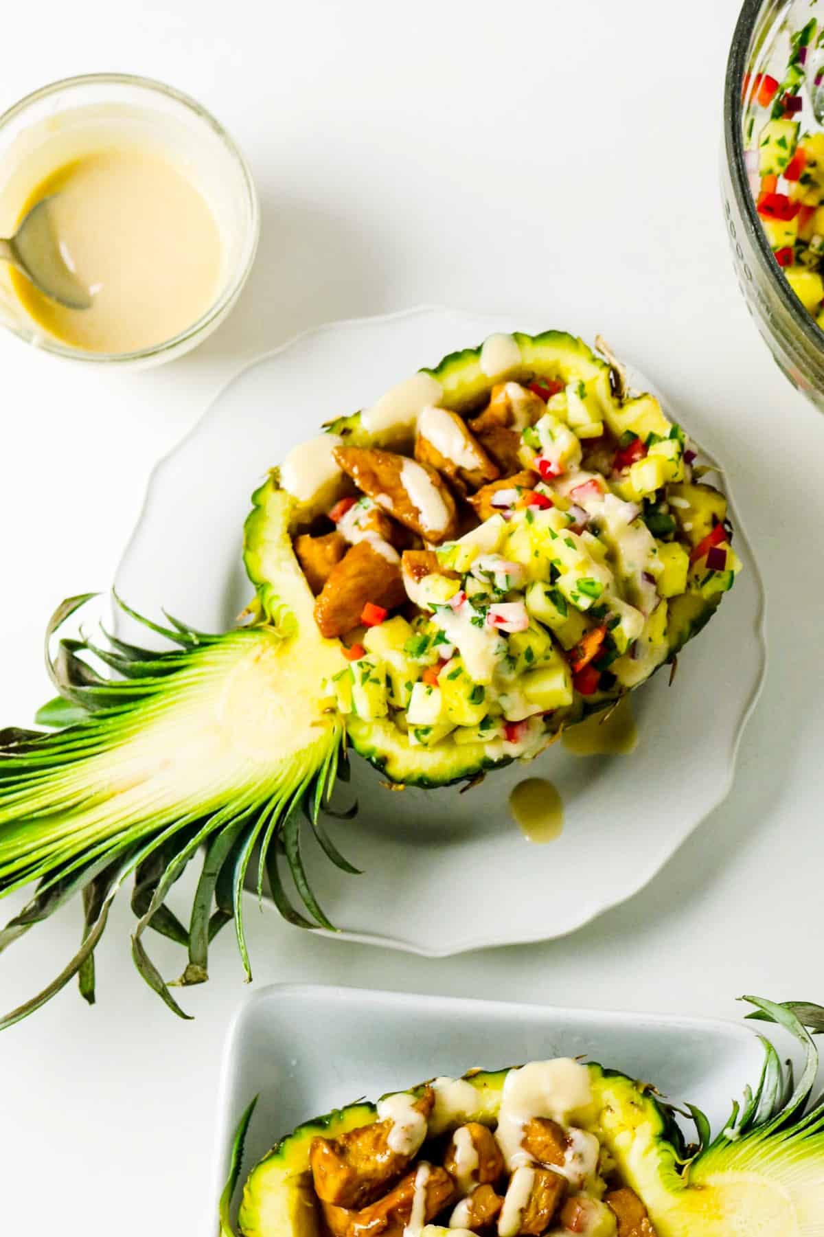 Have a pineapple filled with chicken and pineapple salsa.