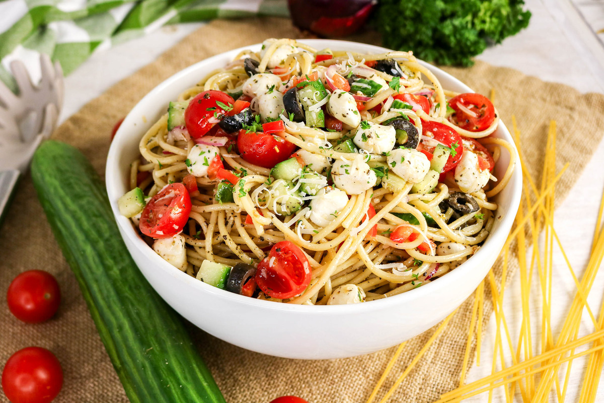Cold pasta salad in a serving bowl.