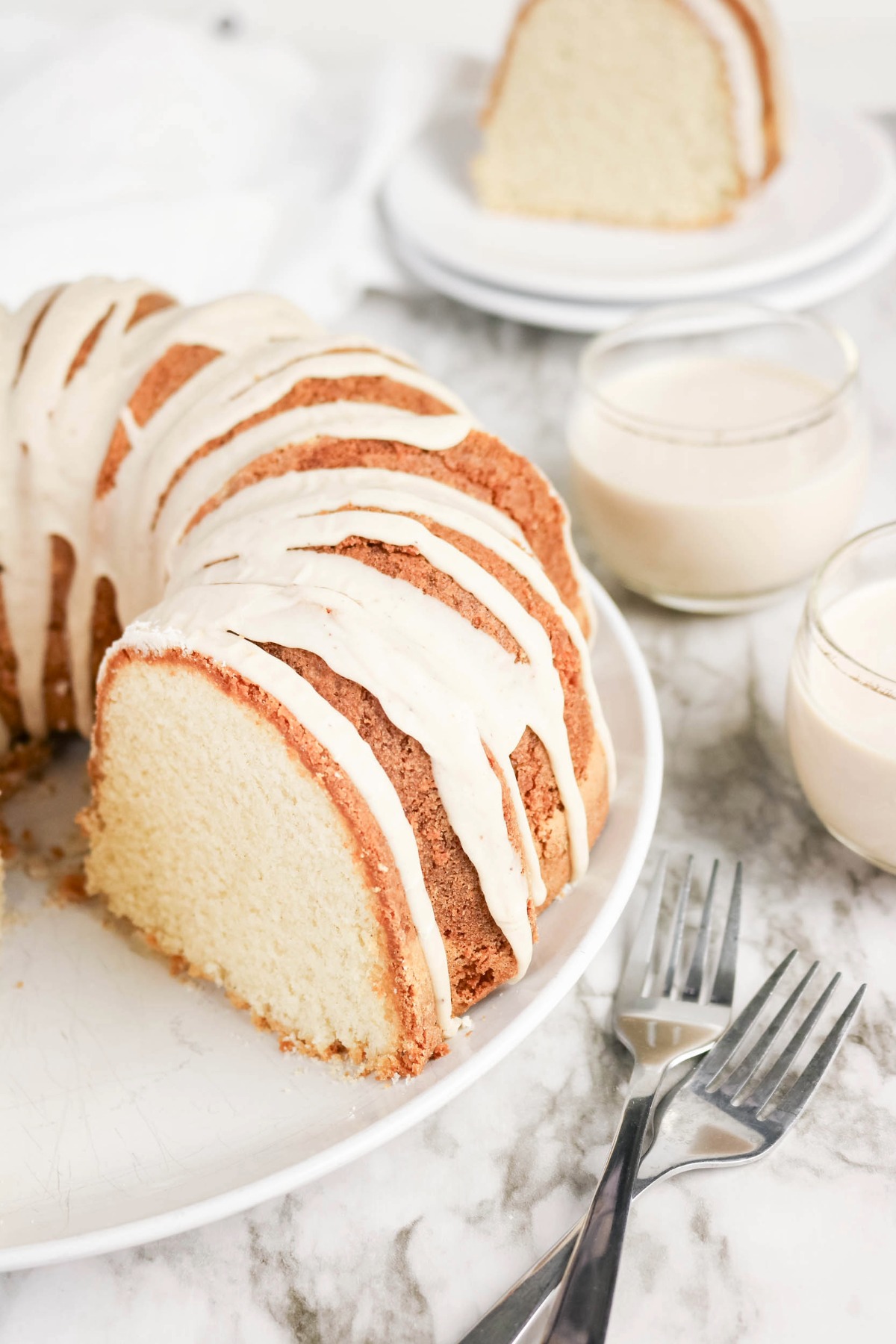 Overhead view of pound cake with drizzle over the top.